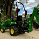 Baggerlader John Deere 1023E