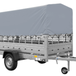 Autotransportanhänger auf Federn 264×125 UNITRAILER GARDEN 264/R KIPP mit Gitterwänden, H-800 Rahmen und grauer Plane